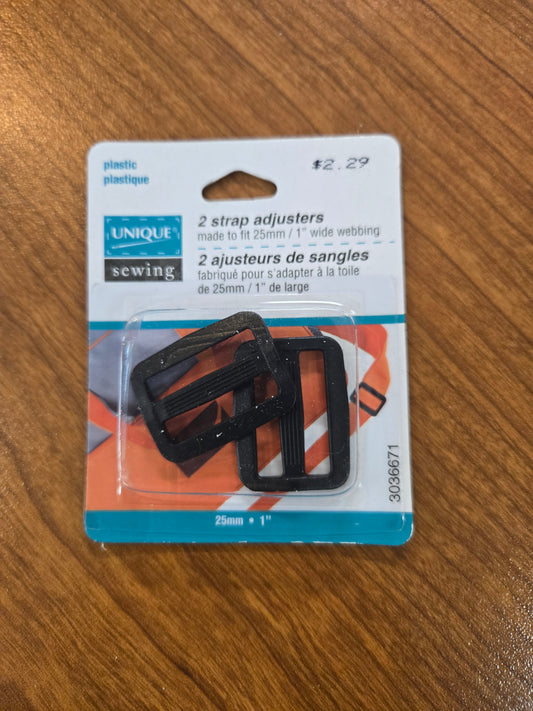 2 ajusteurs de sangles